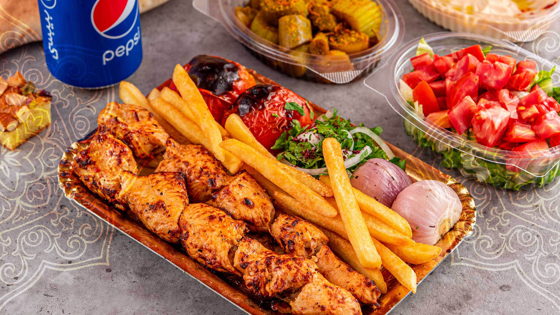 Charcoal Chicken Grills at Zarzoor Iraqi Kabab ​